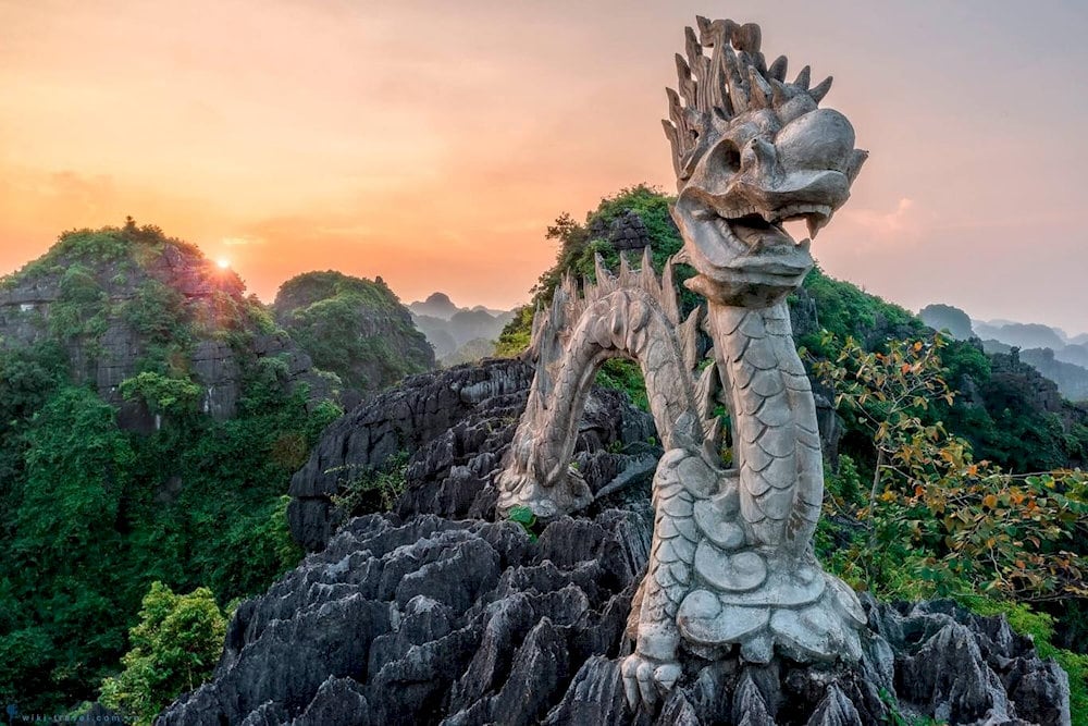 Majestic dragon statues (on Lying Dragon Mountain), standing as silent sentinels of the former royal land